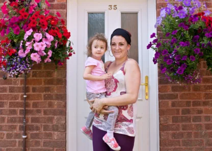 Mum and child on doorstep