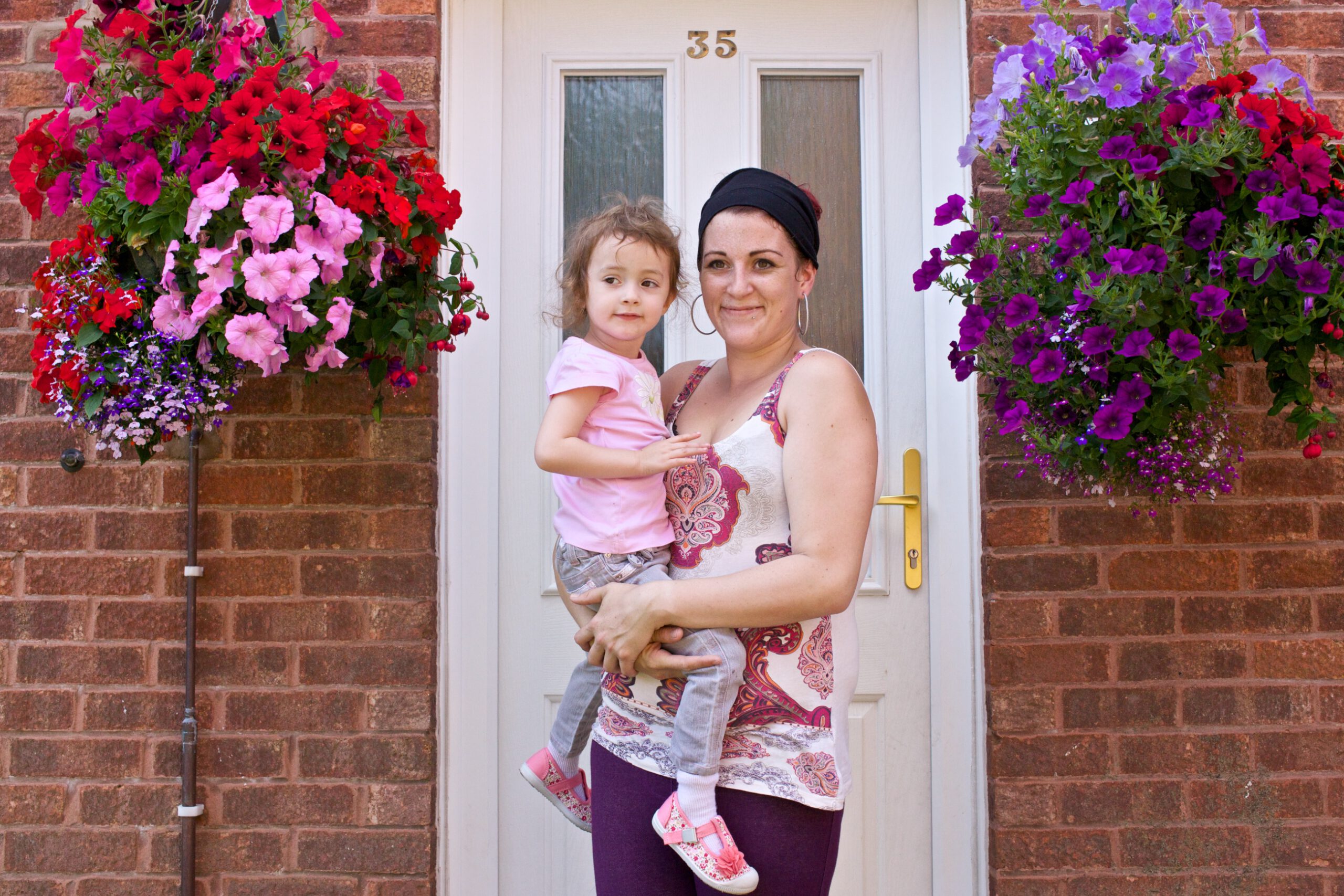 Mum and child on doorstep